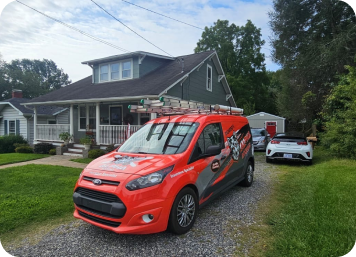 a work van in front of a home